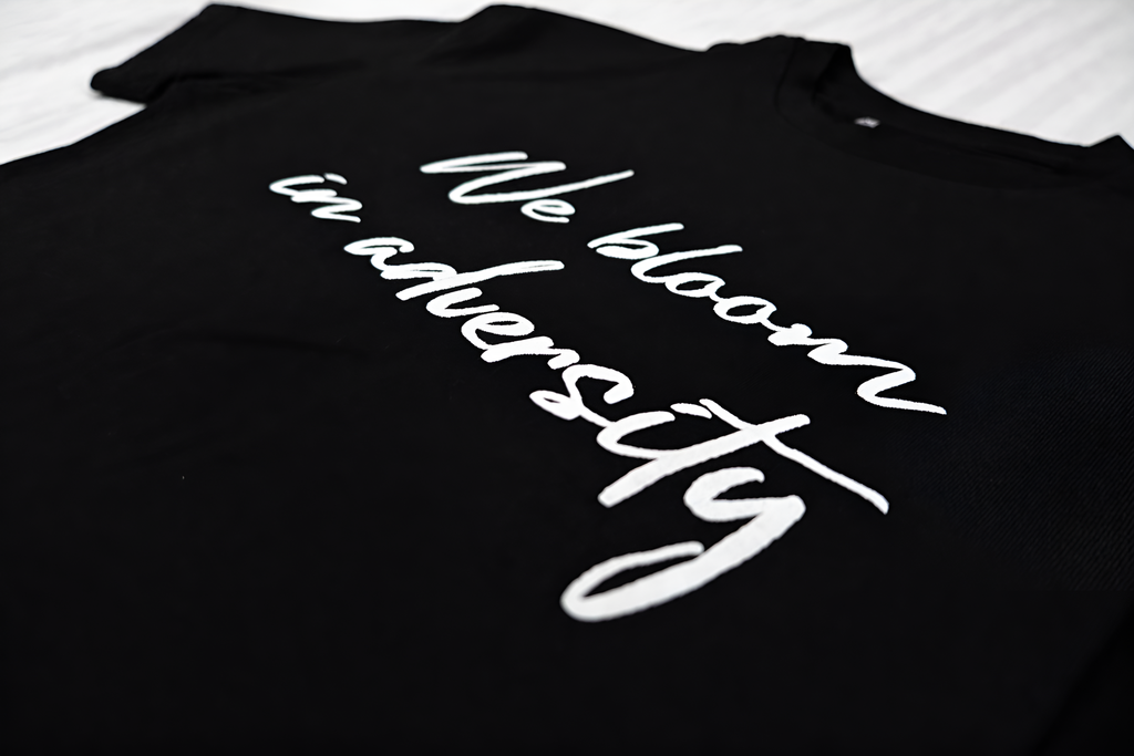 Black printed Oversized unisex tee.