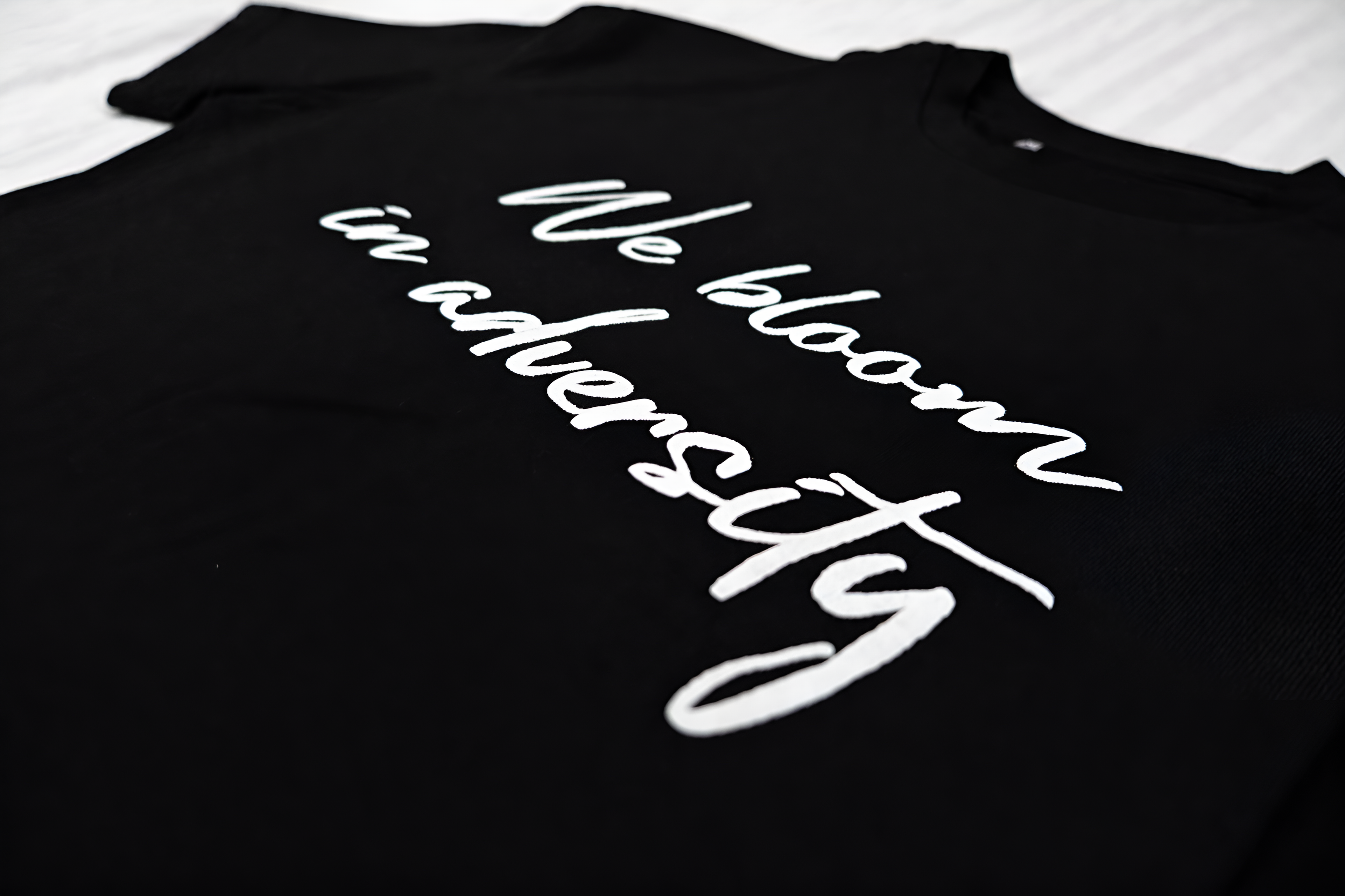 Black printed Oversized unisex tee.